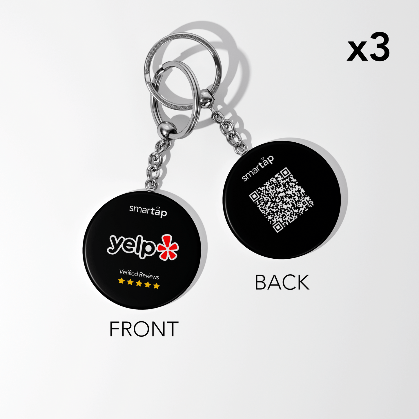 Set of three Yelp keychains with customizable NFC chip and QR code, black round PVC design showing Yelp logo and 5-star reviews on front and QR code on back.